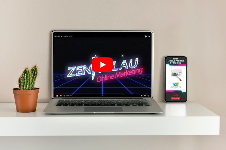 Laptop mit YouTube Videoanzeige und Handy mit HTML5 Banner