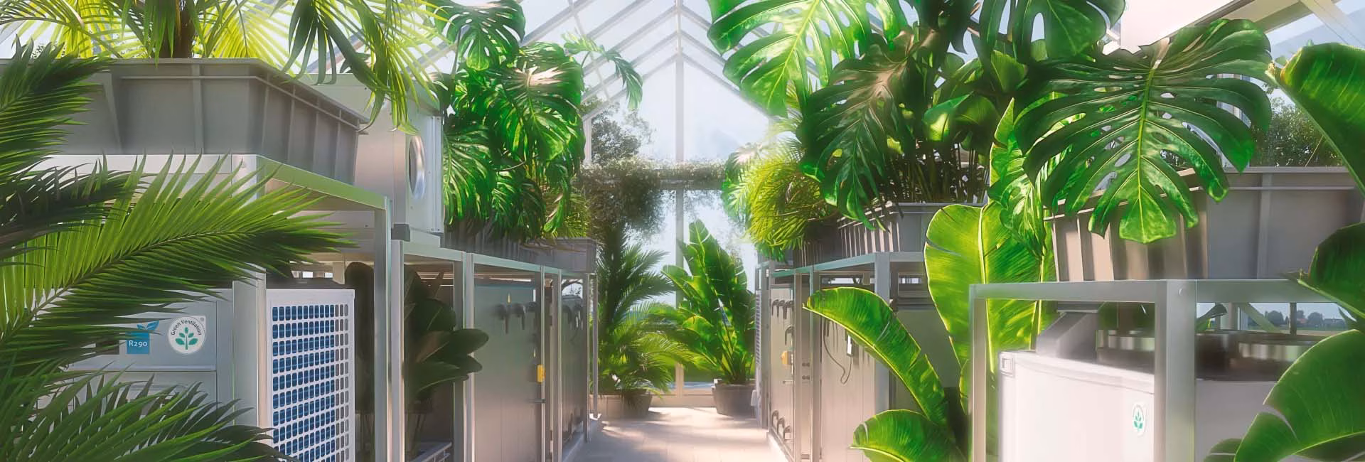 Moderne Gewächshausumgebung mit großen grünen Pflanzen und energiesparenden Klimageräten von Systemair.