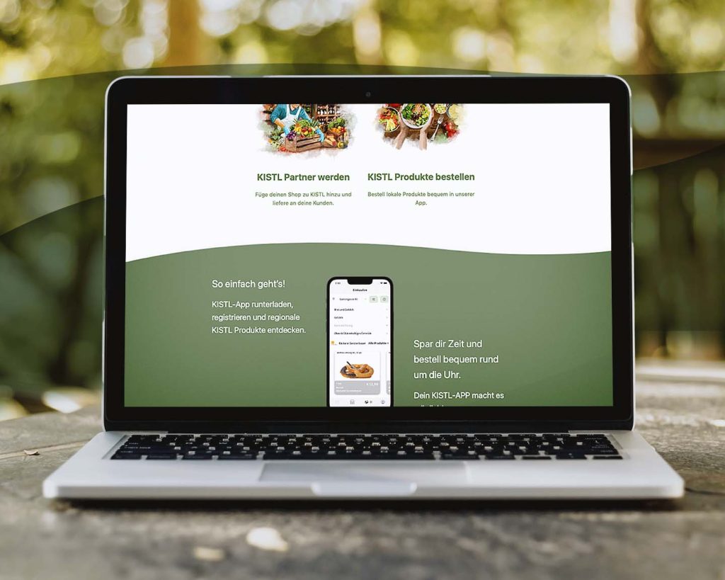 Wordpress Website für Kistl.app 2 Laptop zeigt Website der KISTL-App mit Infos zur Bestellung regionaler Produkte und Partner-Option für Händler.